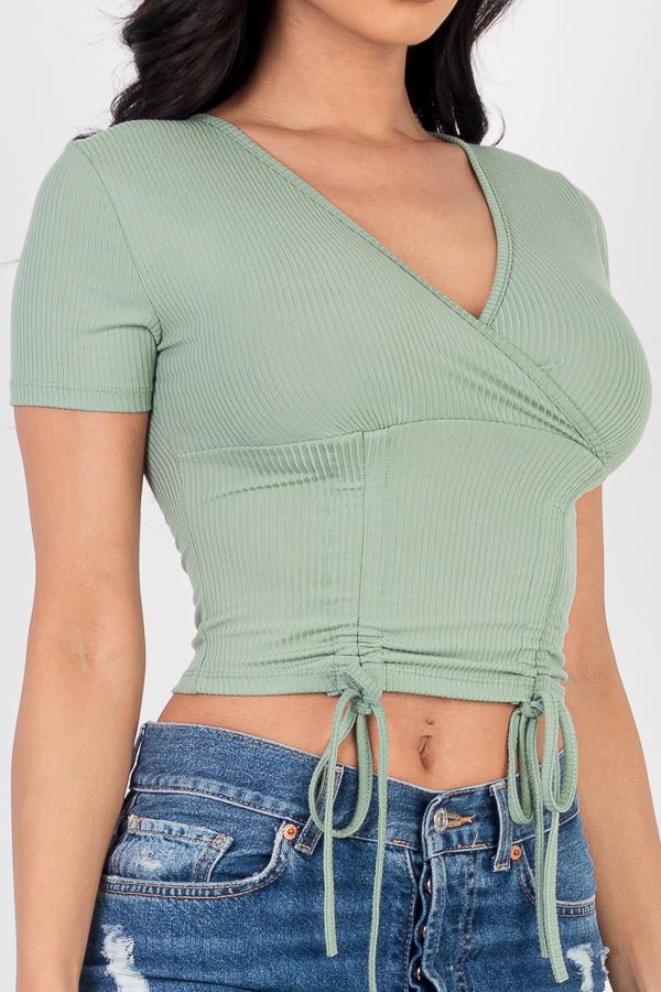 Casual Basics Ribbed Ruched Drawstring Surplice Top - ShopRbls