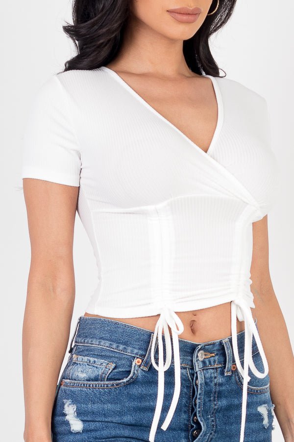 Casual Basics Ribbed Ruched Drawstring Surplice Top - ShopRbls