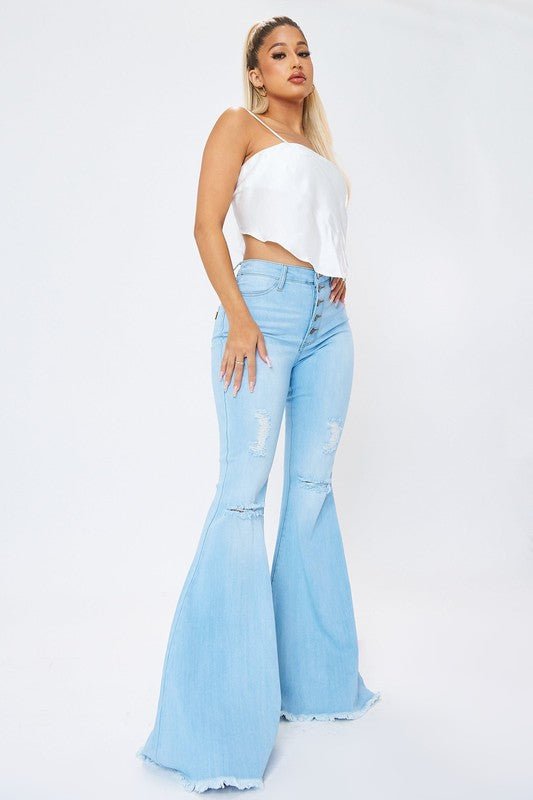 Curves Ahead High Rise Distressed Flare Jeans - ShopRbls