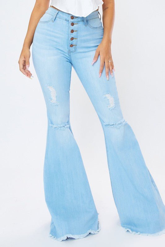 Curves Ahead High Rise Distressed Flare Jeans - ShopRbls